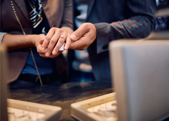 Trying on a diamond ring